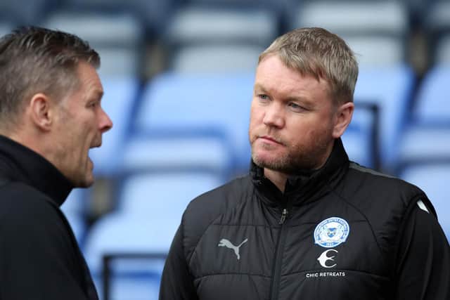 Shrewsbury manager Steve Cotterill (left) with Posh boss Grant McCann before the FA Cup tie. Photo: Joe Dent/theposh.com.