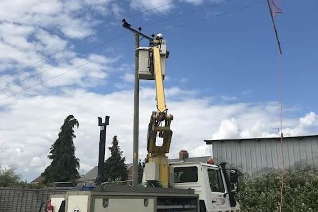 The cat was stuck at the top of a power line in Northam Close, Eye for three days before being rescued using a cherry picker.