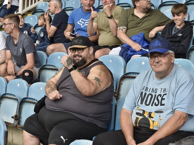 Peterborough United fans watch their side's defeat to Derby County.