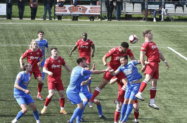 Stamford AFC (red) in action. Photo: David Lowndes.