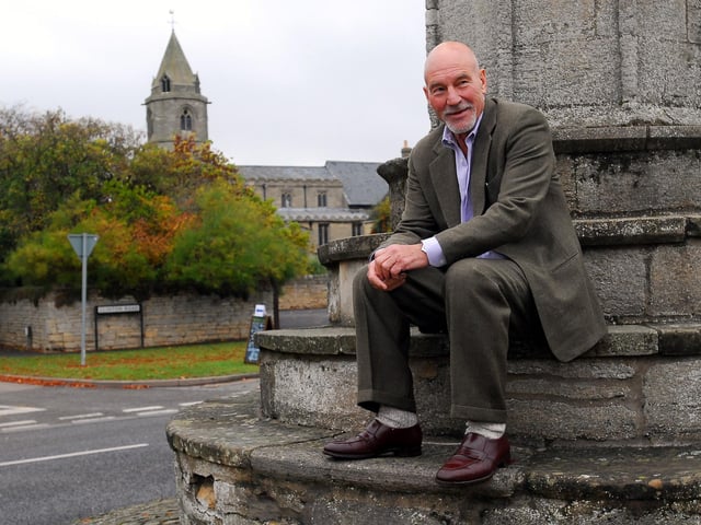 Sir Patrick posing for the cameras.