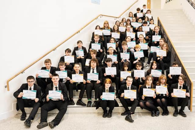 Students from the Thomas Clarkson Academy with their certificates from the Intermediate Mathematical Challenge.