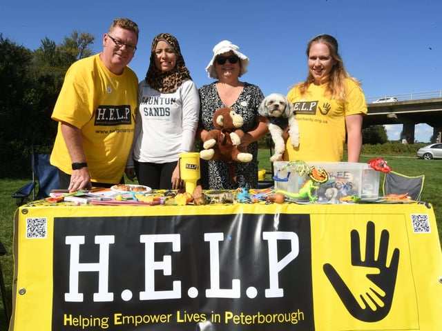Volunteers Mark Murray, Engy Morsy, Jill Murray and Beckie MacLellan with Snoopy the dog.
