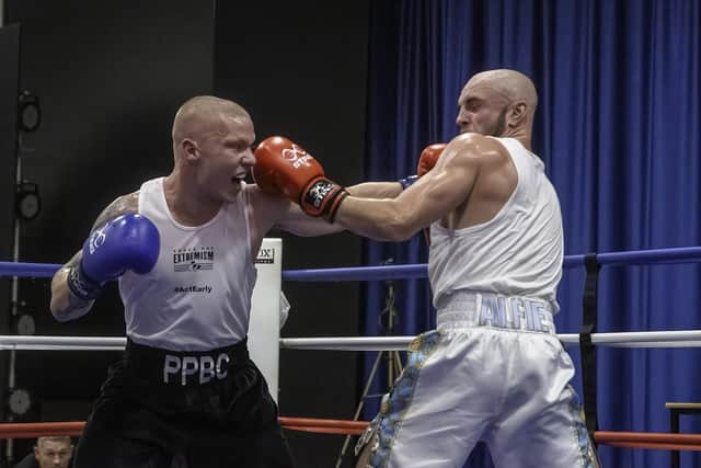 Fighter of the night Alfie Pearce (left) in action.