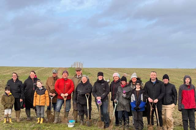 Some of the volunteers at one of the tree planting days. 