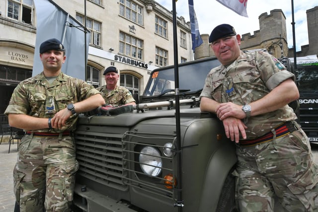 158 Reg Royal Logistics Corps soldiers Cpl Thomas Jackson, Pvt Stehpen Johnson and Cpl Martin Skidmore during the Armed Forces Day celebrations in Cathedral Square, Peterborough