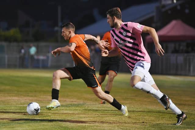 Action from Peterborough Sports (orange) v Curzon Ashton. Photo: David Lowndes.
