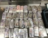 Bundles of cash believed to be at Mon Cher Cafe