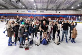 Staff from Amazon in Peterborough celebrate with friends and families at Planet Ice.