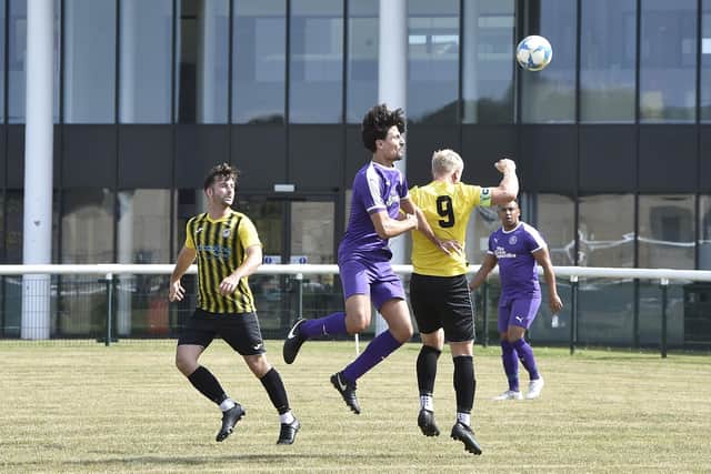 Action from a recent Stanground Sports (purple) match. Photo: David Lowndes.