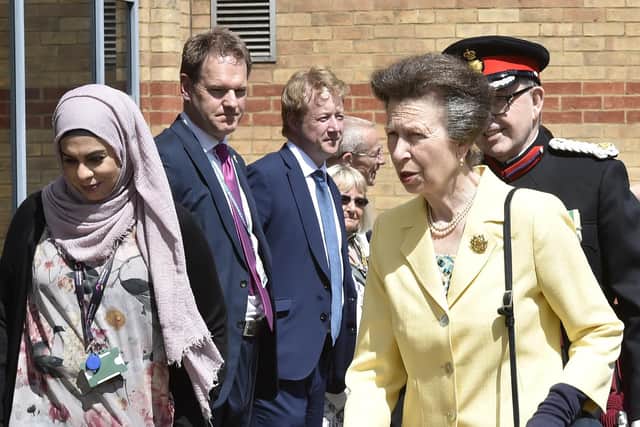 Princess Anne made her way to the library after being flown to Peterborough by helicopter (image: David Lowndes)