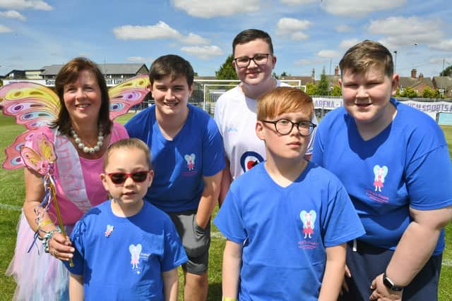 Anna's Hope founder Carole Hughes pictured with some of the family youngsters supported by the charity (image: David Lowndes)