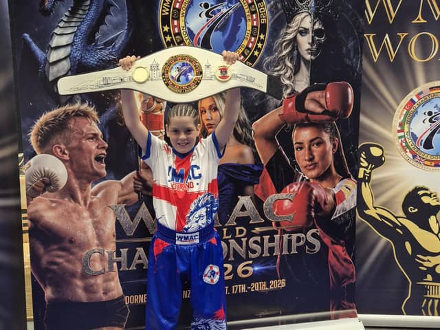Aaron Lock shows off his World Championship belt in Austria.