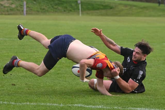 Harry Anderson (left) in action for Borough. Photo David Lowndes.