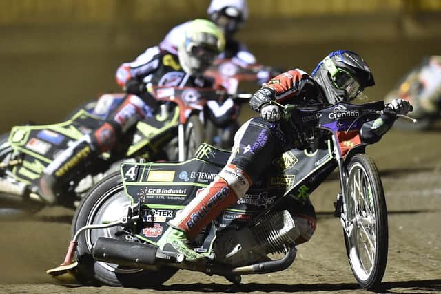 Heat 9 action from Panthers v Belle Vue involving city riders Jordan Jenkins (red helmet) and Benjamin Basso (blue).