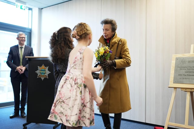 Evlyn, aged 8, and Keevah, aged 11 – whose fathers work at the fire station – presented Her Royal Highness with a posy