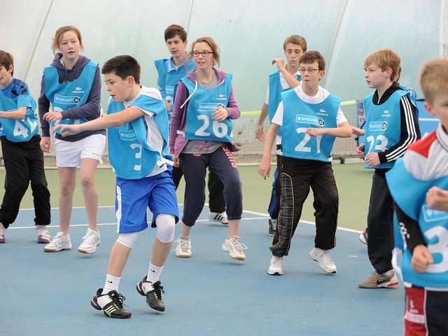 Jamie Odell, 12, (front left) during trials at Thorpe Wood Racquets Club to become ball boys/girls for top tennis professionals at the O2 arena
