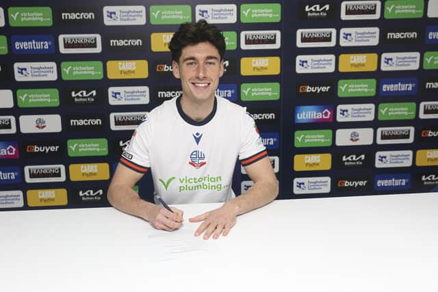 Joel Randall signs for Bolton Wanderers. Photo Paul Currie - BWFC.