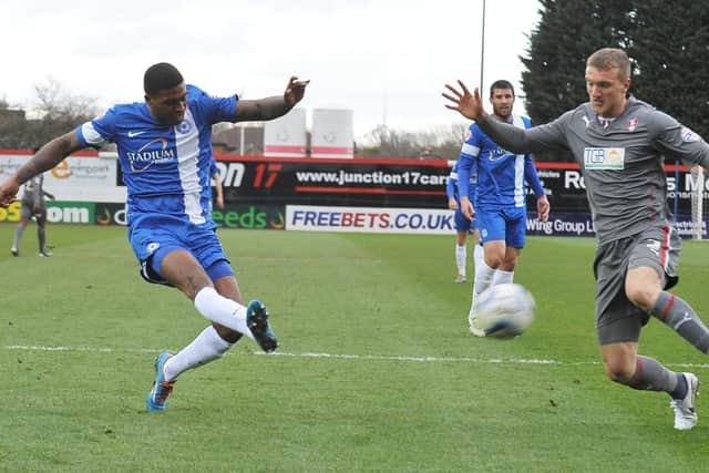 Mark Little (left) in action for Posh. Photo: David Lowndes.