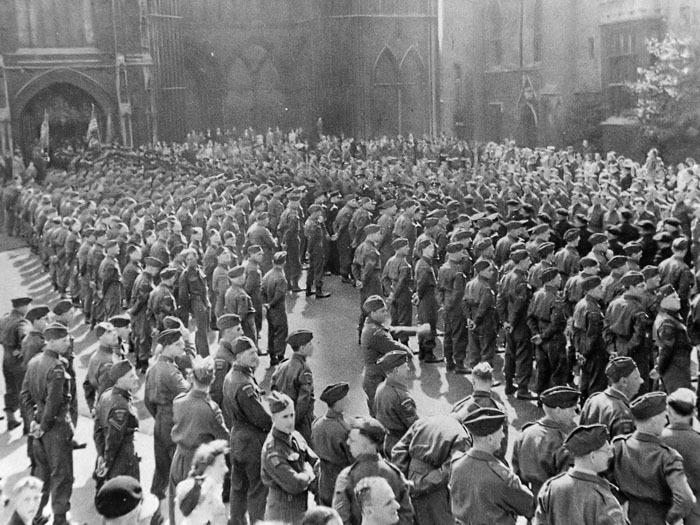Troops pictured in front of the Cathedral in 1945 preparing for the city's VE Day parade.