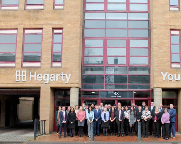 Staff outside Hegarty's offices in Broadway, Peterborough.