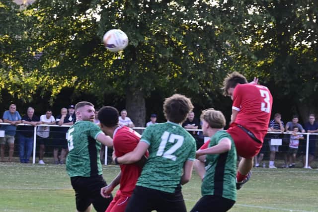 Action from the midweek friendly between Blackstones (green) and Stamford AFC. Photo David Lowndes