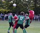 Action from the midweek friendly between Blackstones (green) and Stamford AFC. Photo David Lowndes
