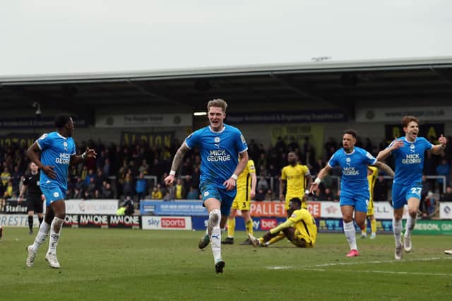Josh Knight of Peterborough United celebrates his goal against Burton Albion. Joe Dent/theposh.com.