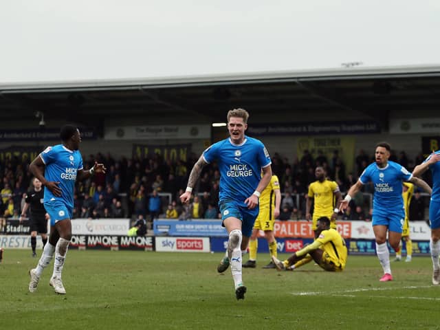 Josh Knight of Peterborough United celebrates his goal against Burton Albion. Joe Dent/theposh.com.