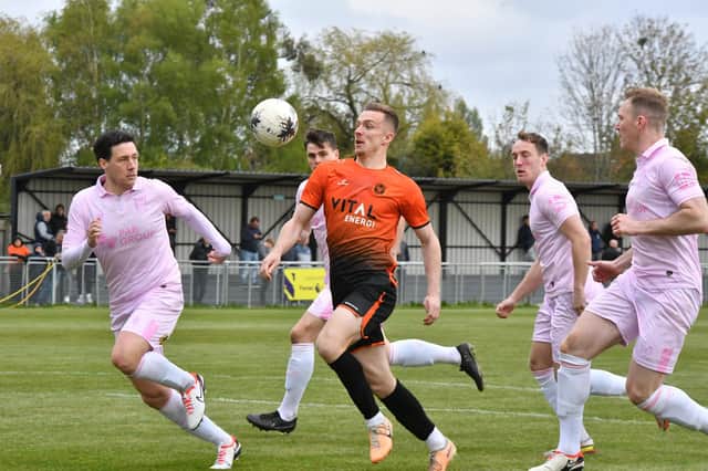 Action from Peterborough Sports (orange) v Chorley. Photo David Lowndes.