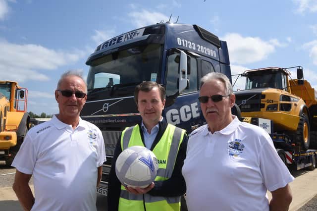 Dan Harris of GCE Hire Fleet (centre) with PFA Chairman David Barfoot (right) and vice chairman Alan Poulain. Photo: David Lowndes.