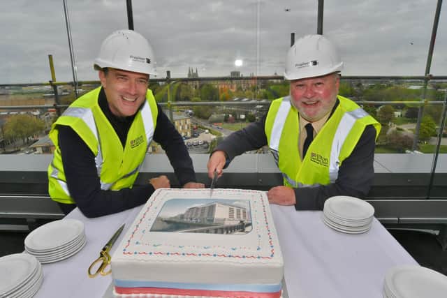 The topping out ceremony at the Hilton Garden Inn, Fletton Quays, in 2022 with managing director of  Hilton UK Stephen Cassidy, left, and Councillor Wayne Fitzgerald, leader of Peterborough City Council.