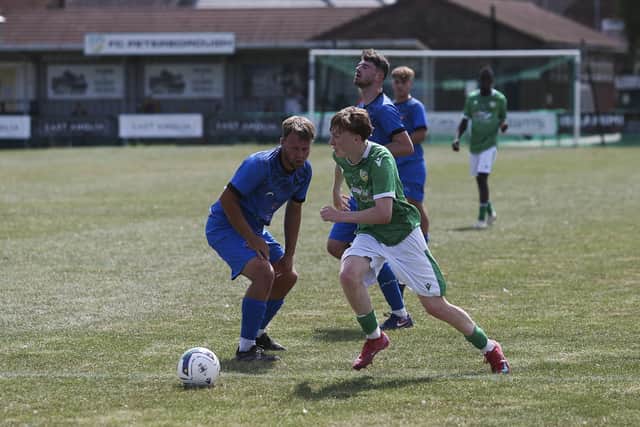 Action from FC Peterborough Res (green) v Whittlesey Athletic.