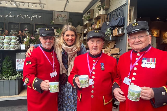 Designer Sophie Allport with Chelsea Pensioners during the Chelsea Flower Show in 2022.