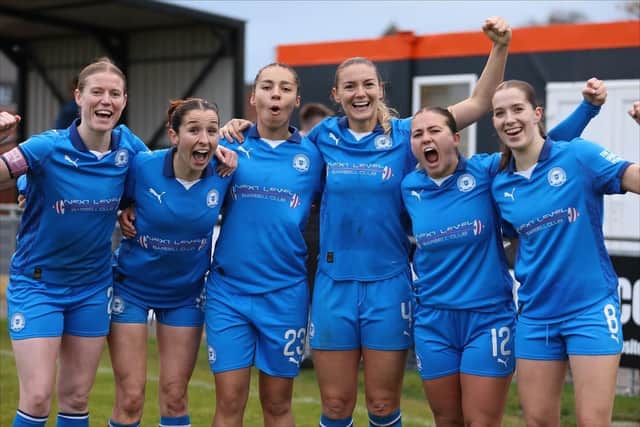 Posh celebrate their FA Cup first round success against Real Bedford. Photo Darren Wiles