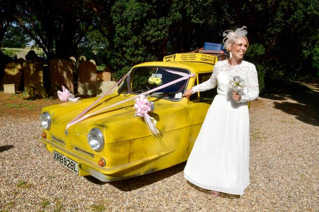 Bride Sylvia Attwell arriving at her wedding in an Only Fools and Horses three-wheeler (image: David Dawson).