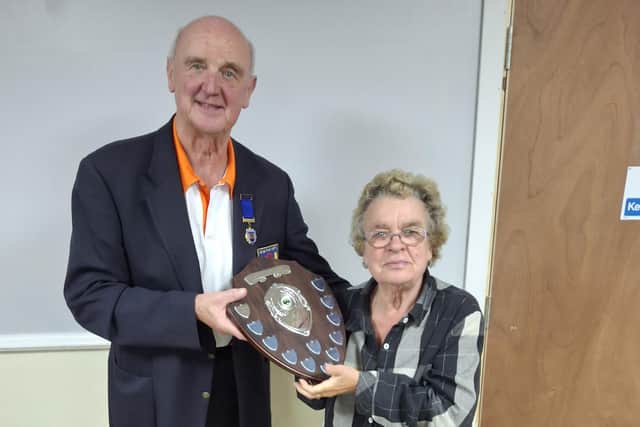Sue Watson presents the Cliff Watson Memorial Shield to NBF chairman Martyn Dolby.