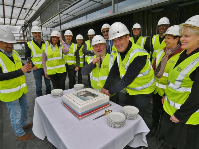 The topping out ceremony at the Hilton Garden Inn, in Fletton Quays, Peterborough in Hotel, Fletton Quays in April 2022.