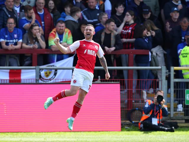 Jack Marriot celebrates a Fleetwood goal. (Photo by Ashley Allen/Getty Images).
