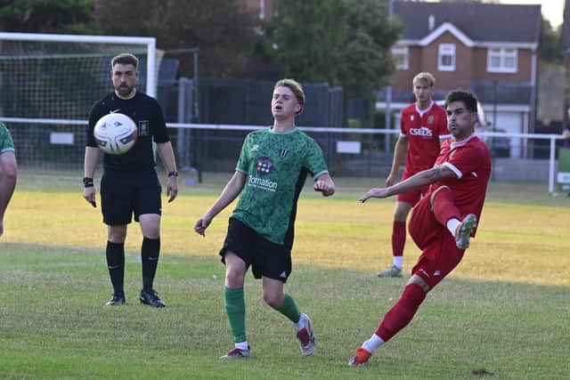 Action from the midweek friendly between Blackstones (green) and Stamford AFC. Photo David Lowndes