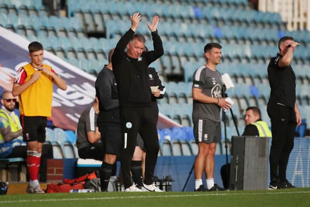 Peterborough United Manager Darren Ferguson claps the supporters after they show their support towards him. Photo: Joe Dent.