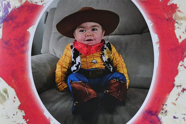 Riain dressed as Woody from Toy Story.