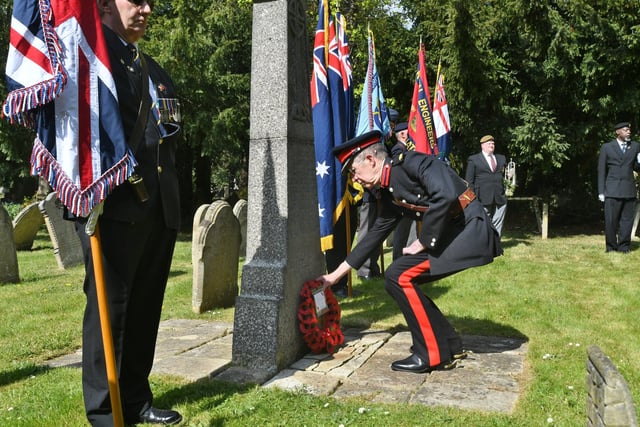 Deputy Lieutenant of Cambs His Honour Judge Neil McKittrick DL laying a wreath at Sgt Hunter's grave