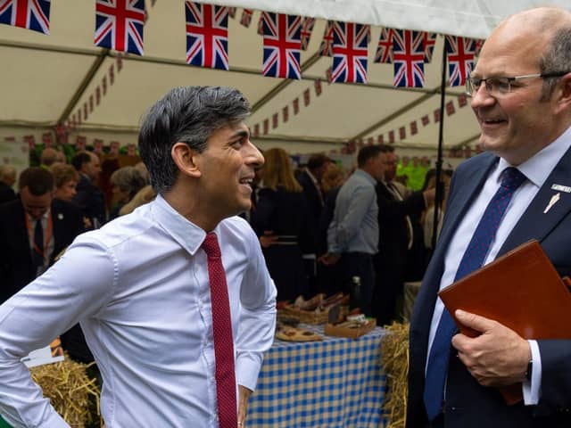 Prime Minister Rishi Sunak speaking with NFU President Tom Bradshaw at the Farm to Fork Summit.