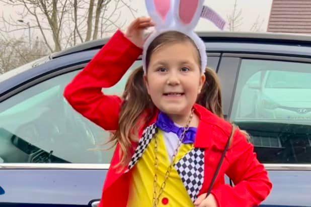 Jo Darwesh said her White Rabbit 'was very nearly late…after forgetting her coat'