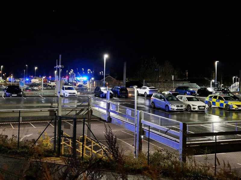 Police are stationed all over the station car park.