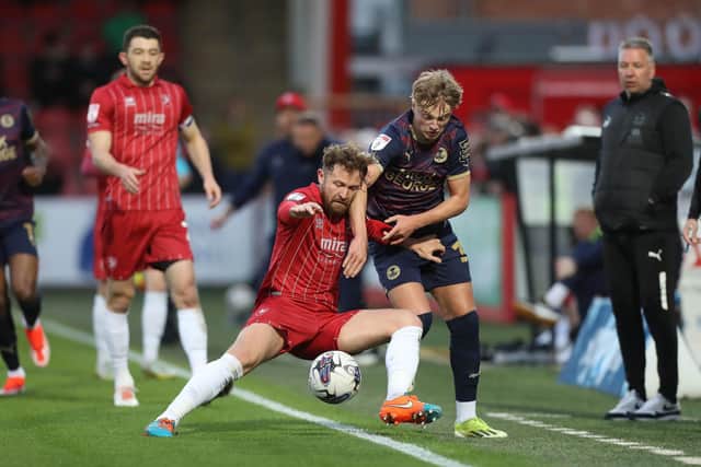 Harley Mills in action on his Football League debut for Posh at Cheltenham on Tuesday. Photo: Joe Dent/theposh.com