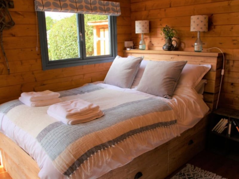 The bed was made from driftwood washed up on the nearby beach.