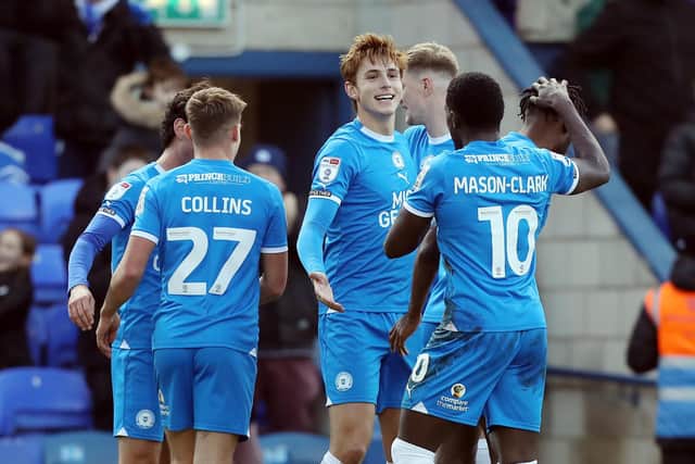 Hector Kyprianou is congratulated after his goal for Posh against Oxford. Photo: Joe Dent/theposh.com.