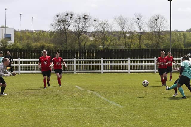 Larissa Frederick scores for Netherton United Women at Ely. Photo Tim Symonds.